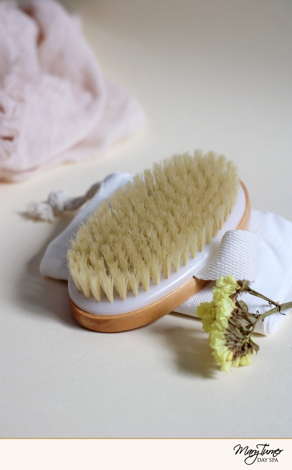 A natural-bristle body brush and soft towels