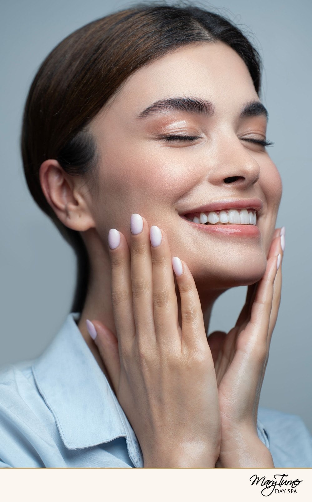 Smiling woman with fresh, glowing skin and soft natural makeup