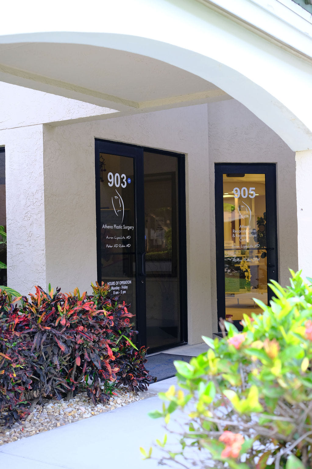 Clean, professional medical spa treatment room with neutral tones at Athena Med Spa and Salon in West Palm Beach
